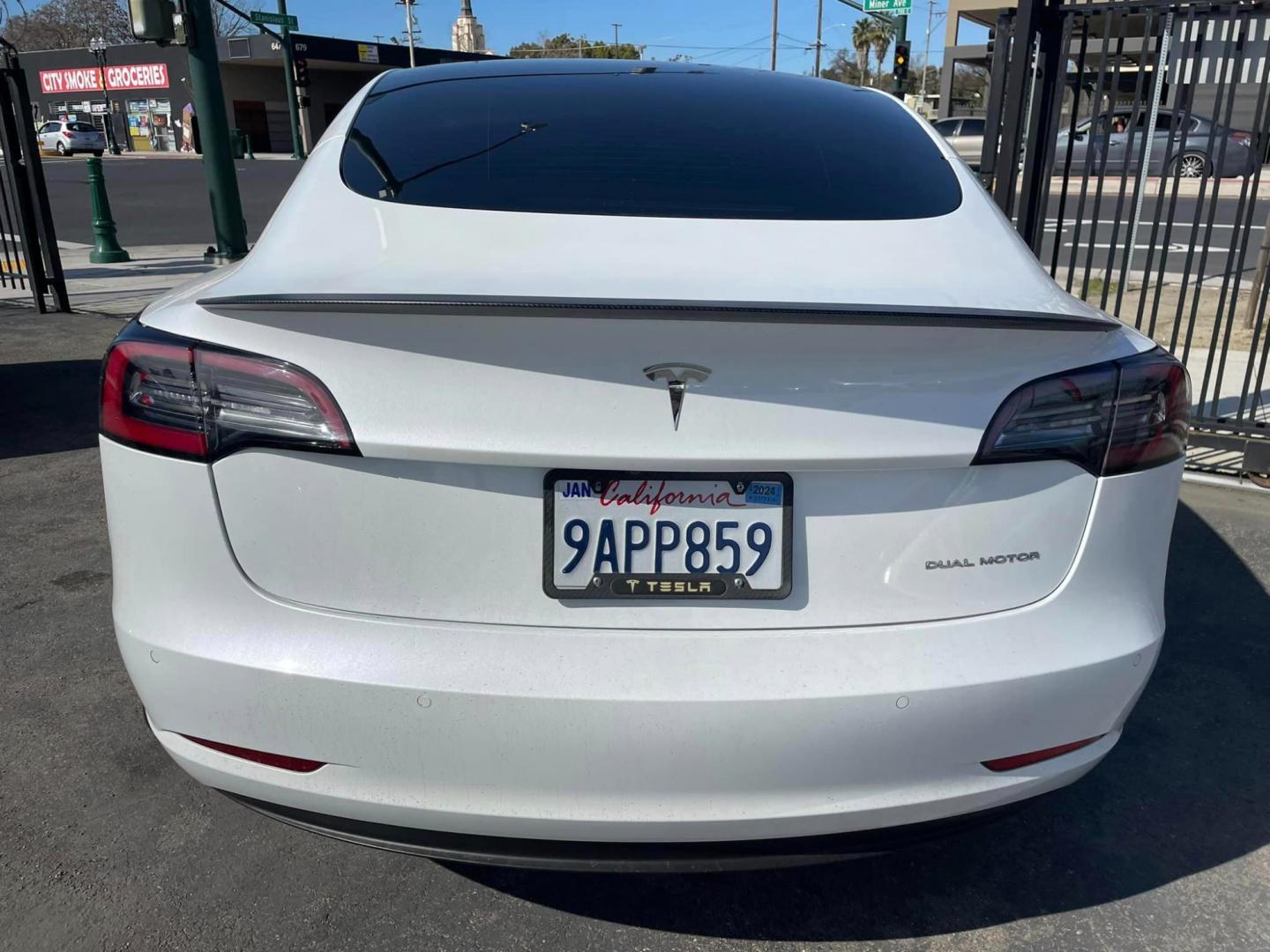 2021 WHITE /BLACK Tesla Model 3 Long Range (5YJ3E1EB8MF) with an ELECTRIC engine, 1A transmission, located at 744 E Miner Ave, Stockton, CA, 95202, (209) 944-5770, 37.956863, -121.282082 - Photo#9